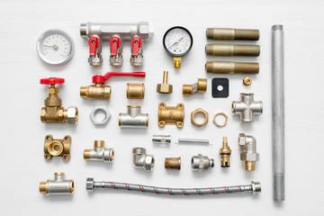 Plumbing equipment flat lay background.