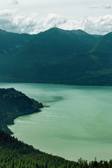 Ocean that appears very still and teal, Squamish, BC, Canada