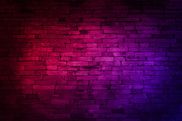 Plakat Neon light on brick walls that are not plastered background and texture. Lighting effect red and blue neon background of empty brick basement wall.