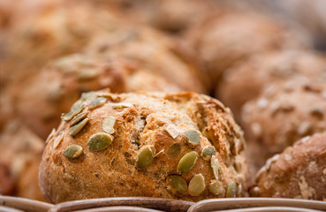Bread buns with seeds. Whole-wheat healthy bread rolls