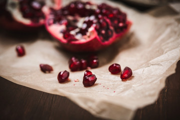 Close up of Pomegranate Seeds with Pomegranate in Background