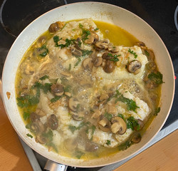 Codfish with mushrooms in the cook