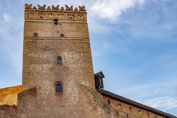 Fototapeta na wymiar Retro castle wall with tower closeup. background with copy space.