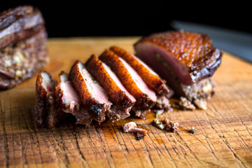 Tilt shift view of sliced seared duck breast