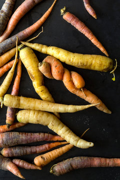 Directly above view of fresh and raw rainbow carrots