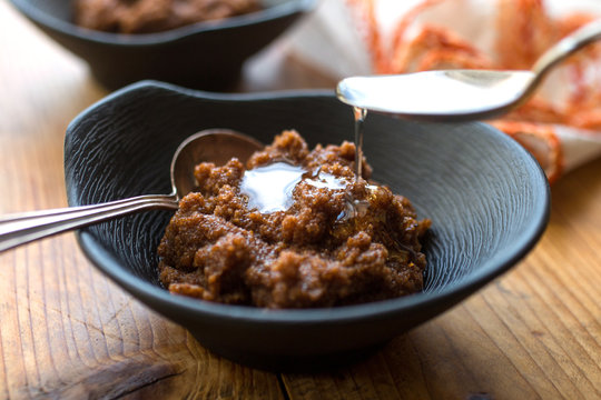 Teff polenta drizzled with toasted hazelnut oil
