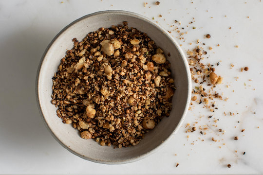 Overhead view of hazelnut dukkah served in bowl