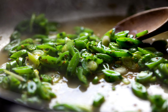 Close up view of sauteed sugar snap peas
