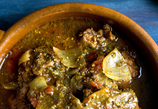 Close up view of coriander cumin chicken in bowl