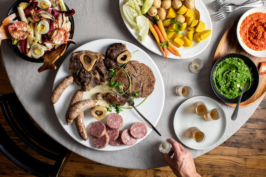 Bollito misto served with dipping sauces