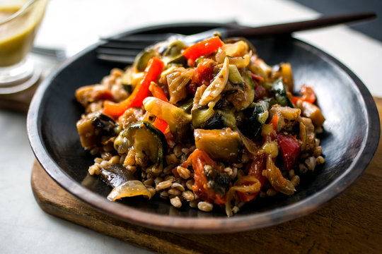 Tilt shift view of summer ratatouille with farro