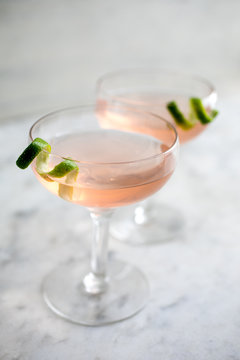 Cocktail in glass with lime zest