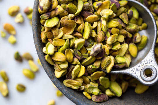 Directly above view of pistachios in bowl