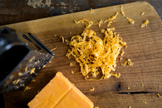 Overhead view of grated cheddar