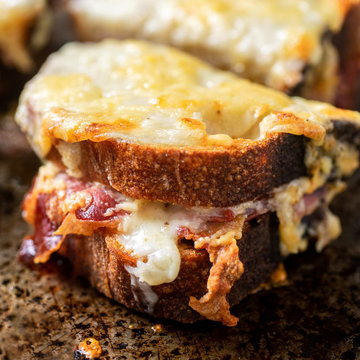 Close up view of ham and cheese croque with Dijon