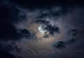 Naklejka na ściany i meble Full moon, between the clouds of winter!