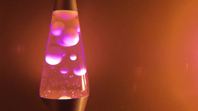 Lava lamp closeup 70s style pink stock footage  with copy space