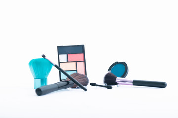 Makeup brushes with eyeshadow and blush cases