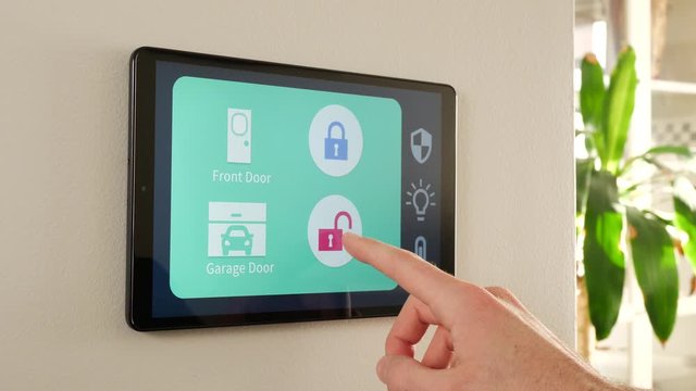Using a smart house control panel to lock the garage door.