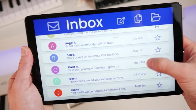 email messages inbox browsing and selecting a conversation to read on a tablet screen.