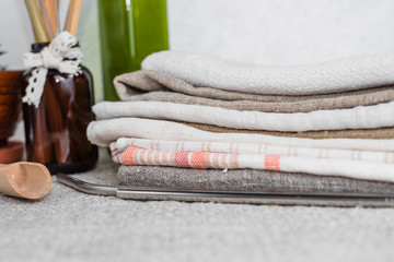 Eco-friendly kitchen set. Zero waste concept. Waste-free domestic life. Plastic free. Bio product. towels, metal and bamboo straws for cocktails, wooden and glass cookware