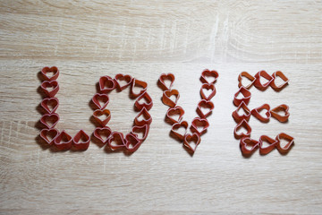 heart Pasta on wooden background