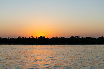 Sunset Over The Water