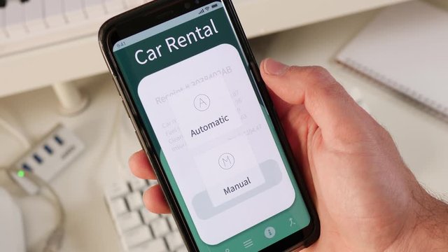 Renting a car directly from a mobile phone application. Choosing the model and options and paying for the service on the screen.