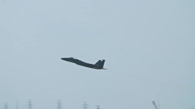 Kadena AB Okinawa Japan Feb 21 2020 Military aircraft taking off and on runway fighter jet, refueler, air tanker, A10, F15,C130 USAF