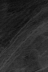Dark grey black slate background or texture.