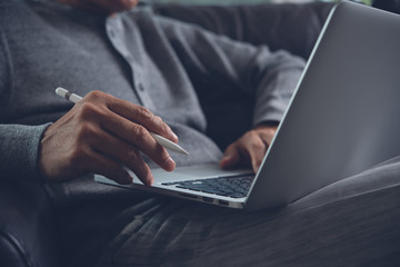 Working on laptop computer