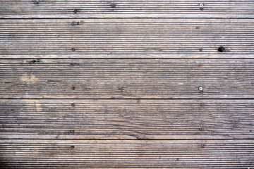 Fototapeta premium A closeup shot of old wooden planks background texture