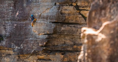 Outdoor Rock Climber climbing