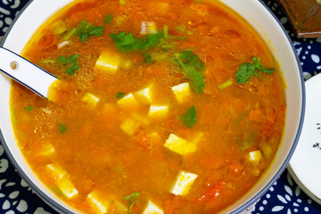 A bowl of Tofu tomato soup stew