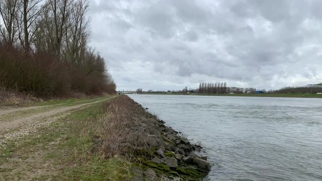 river water passing by germany ship time lapse two parts tree