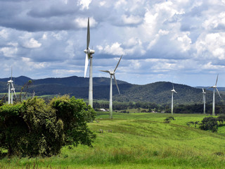 A section of a wind farm showing seven wind turbines in the Atherton Tablelands in Tropical North Queensland Australia © Mr Privacy