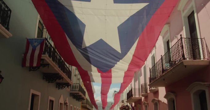 Giant Puerto Rico flag draped over Fortaleza Street in Old San Juan Puerto Rico