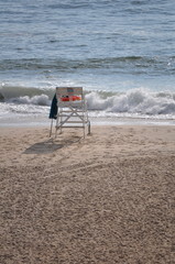 Lone life guard chair on beach