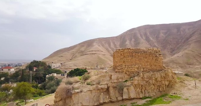 Drone around ancient gate to enter the road between Jericho and Jerusalem.