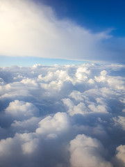 Vertical image of looking above the beautiful clouds in the sky