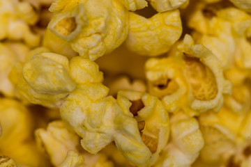 Close up of buttered popcorn kernels