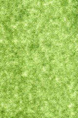 abstract splotchy colorful green parchment paper background