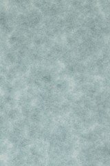 abstract splotchy grey parchment paper background