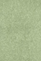 abstract splotchy grey green parchment paper background