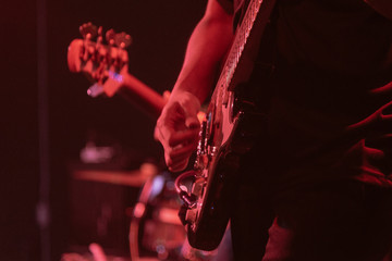 Guitarist on stage for background, soft and blur concept