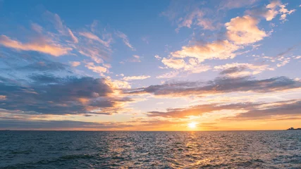 Fotobehang sunset over the sea © Hide_Studio