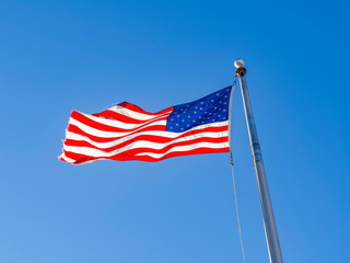 American flag swinging in the Wetlands Park