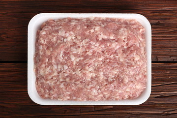 Ground chicken in polystyrene food tray