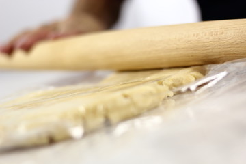 Roll out dough between two layers of clear film. Making Lemon Mascarpone Pie Series.