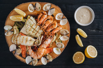 Seafood platter on a black wooden table